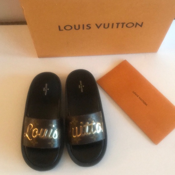 Louis Vuitton slippers - Picture 1 of 8